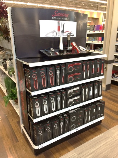 A display of various tools on shelves in a store.